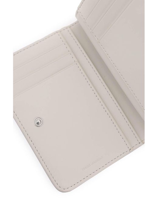La billetera Mini Mini Compact Monogram Marc Jacobs de color White