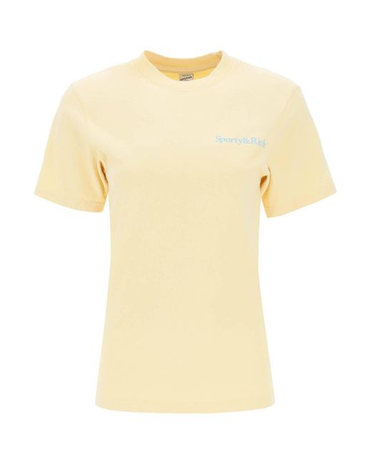 Camiseta deportiva rica 'salud es riqueza' Sporty & Rich de color Yellow