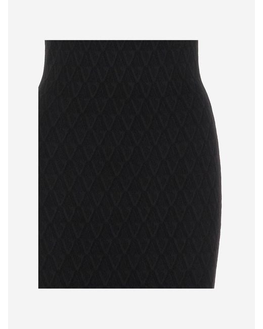 Versace Black Stretch V-Textured Knit Dress With Medusa Brooch Detail