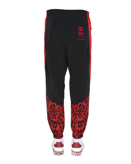Dolce & Gabbana Red Jogging Pants With Animal Print for men