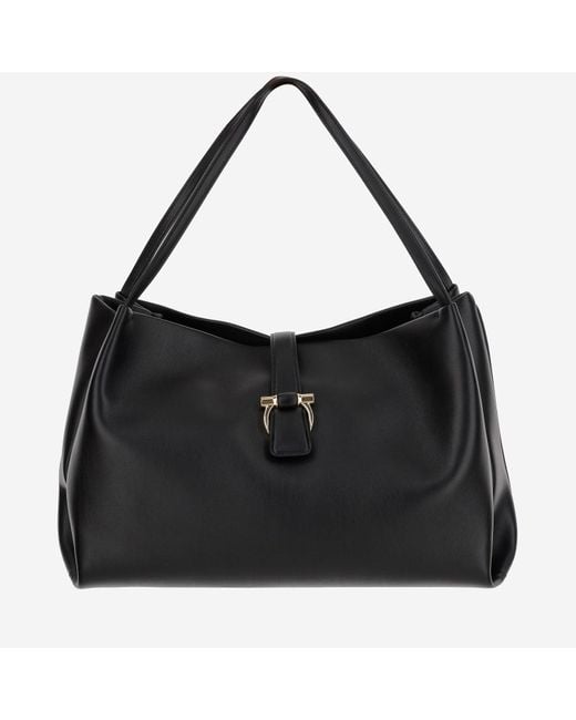 Sac à bandoulière en cuir Ferragamo en coloris Black