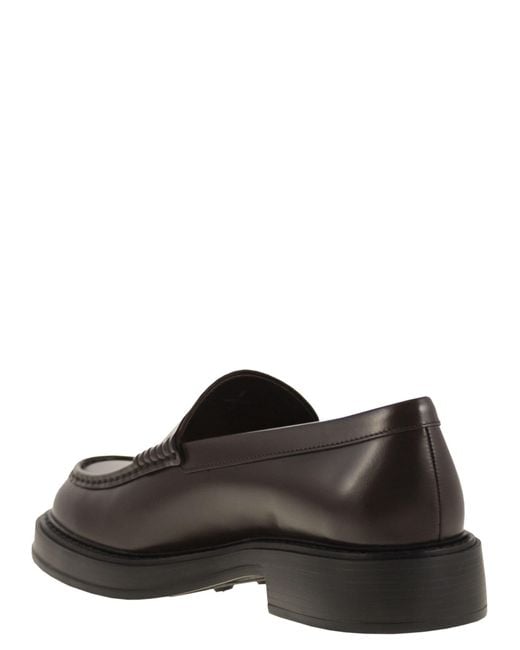 Tod's Black Leather Loafers for men