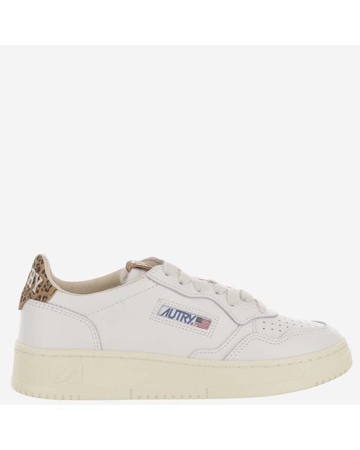 Autry White Low-Top Leather Sneakers With Suede Heel Tab And Logo Accents