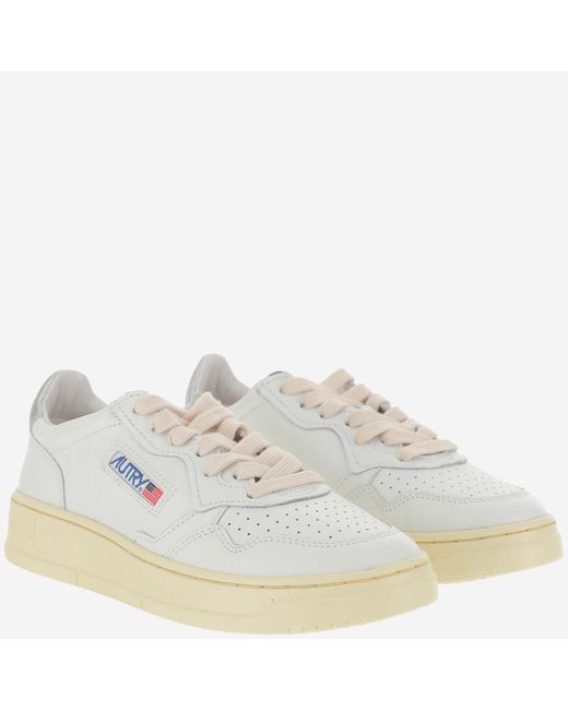 Autry White Leather Trainers With Front Lacing And Metallic Heel Tab