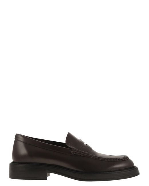 Tod's Black Leather Loafers for men