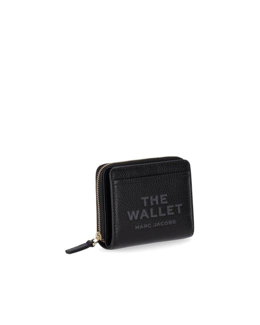 Le mini portefeuille noir compact en cuir Marc Jacobs en coloris Black