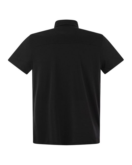 Short Shorted Polo Shirt a Lyocell di Majestic in Black