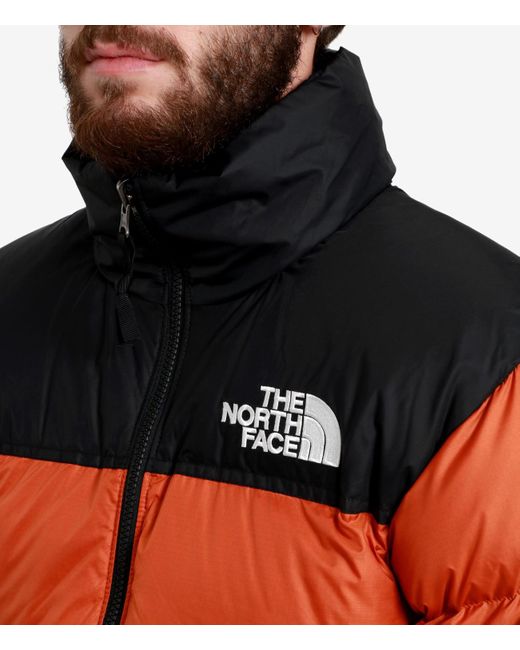 The North Face Orange Coats