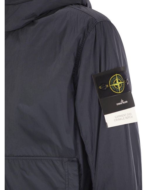Chaqueta acolchada de con goteo y resistente al viento Stone Island de hombre de color Blue