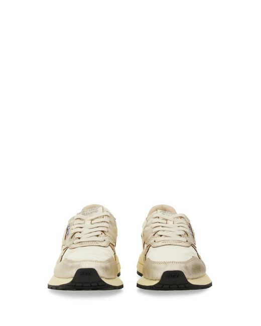 Autry White Medalist/ Leather Trainer