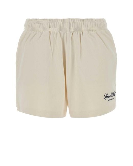 Sporty & Rich Natural Off Logo Short