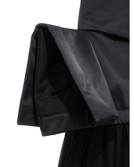 , deux robes matérielles Comme des Garçons en coloris Black