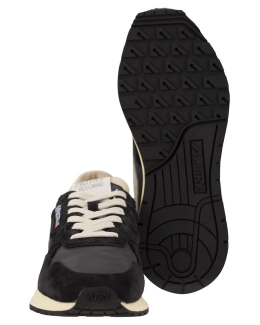Trainer en daim et textile technique en bobine Autry pour homme en coloris Black
