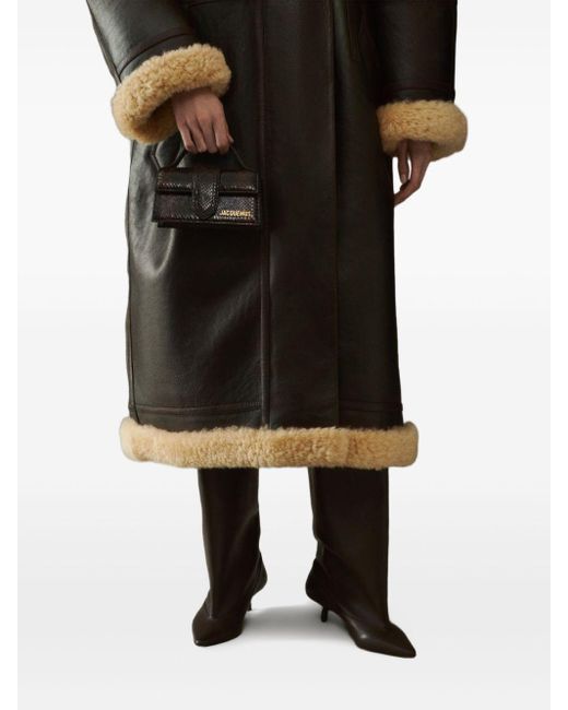 Jacquemus The Bambino Leren Clutch Met Handgreep in het Black
