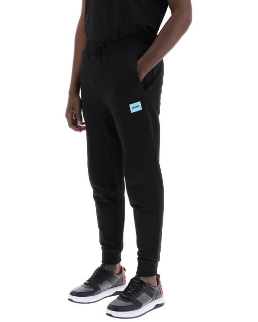 Pantalones de jogger de algodón HUGO de hombre de color Black