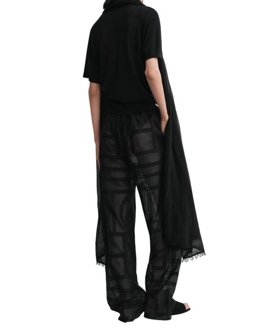 Pantalones de crochet de monograma de en negro Totême  de color Black