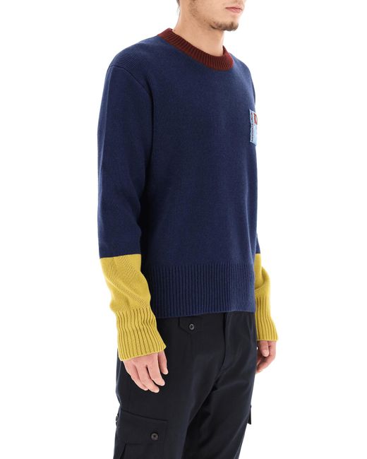Suéter de lana con parche de logotipo Dolce & Gabbana de hombre de color Blue