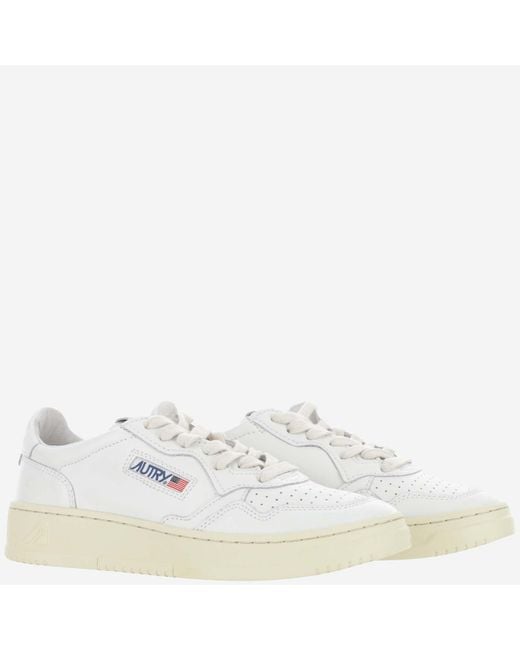 Autry White Low-Top Leather Sneakers With Perforated Round Toe And Logo Detailing