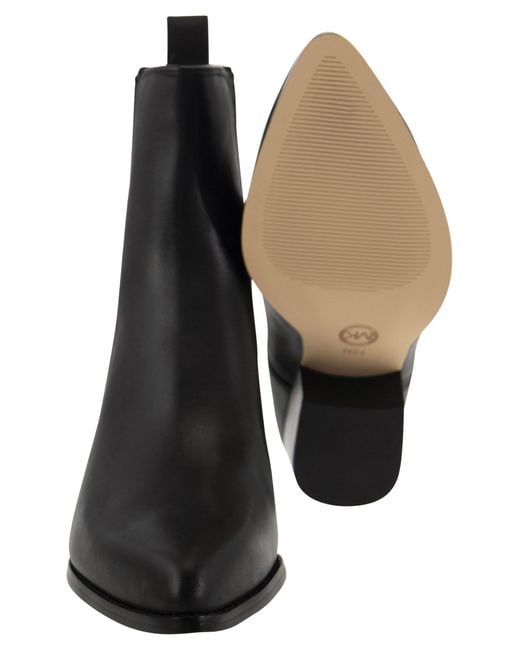 Kinlee Leather y botín de punto elástica MICHAEL Michael Kors de color Black