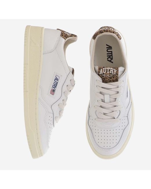 Autry White Low-Top Leather Sneakers With Suede Heel Tab And Logo Accents