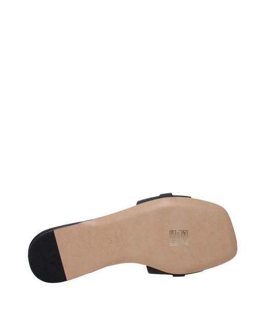 Ferragamo Black Leah Leather Flip Flops And Clogs