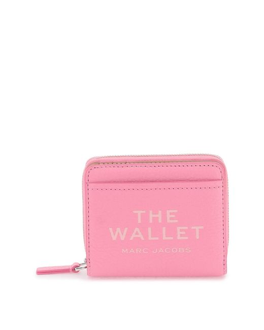 Le mini portefeuille compact en cuir Marc Jacobs en coloris Pink