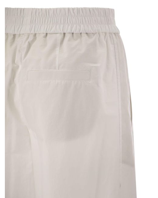 Pantaloni di cotone leggera rilassato di di Brunello Cucinelli in White