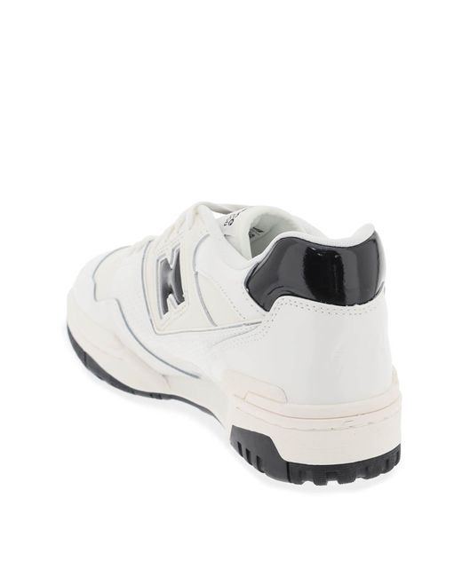 "550 Sneakers de cuero de patente New Balance de color White