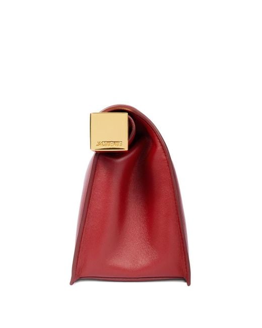 La pochette rond carré embrayage Jacquemus en coloris Red