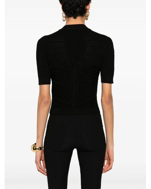 Balmain Black Top mit dekorativen Knöpfen