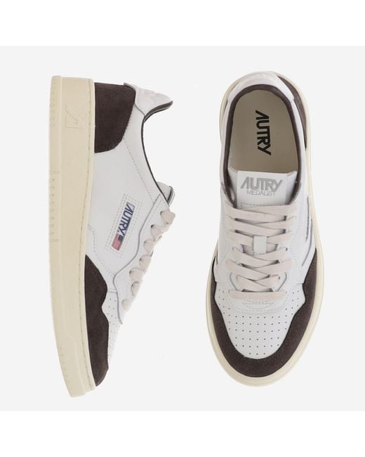 Autry White Round Toe Leather Sneakers With Suede Inserts And Logo Details