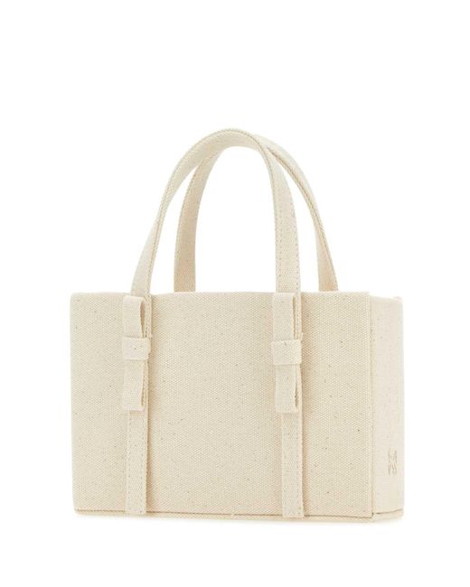 Kara White Ivory Canvas Handbag