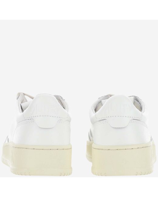 Autry White Low-Top Leather Sneakers With Perforated Round Toe And Logo Detailing