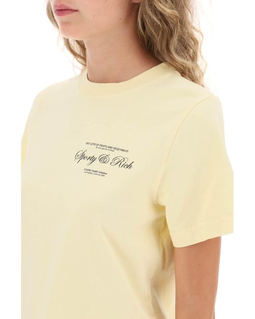 Cropped T -Shirt Sporty & Rich de color Yellow