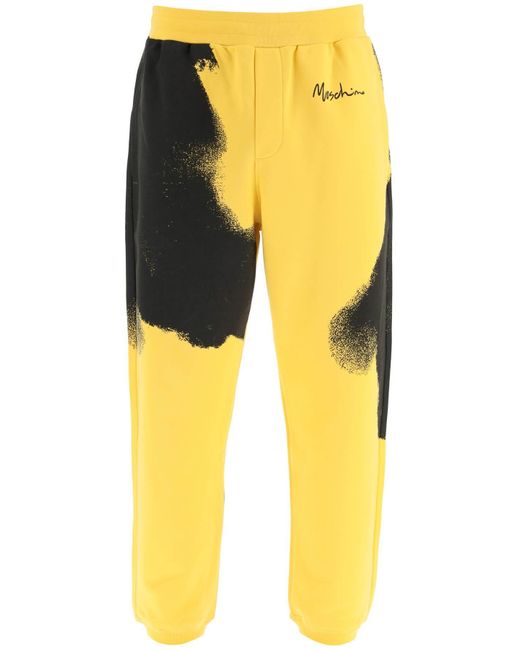 Pantalones de corredor con estampado gráfico con logotipo Moschino de hombre de color Yellow