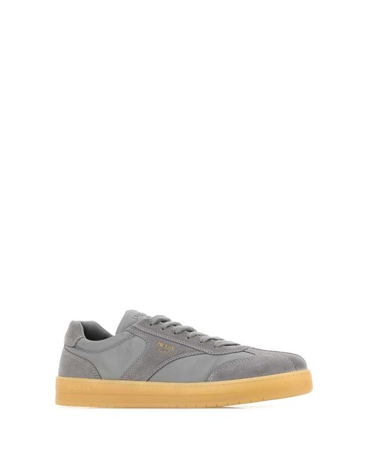 Prada Gray Solid Sneakers for men