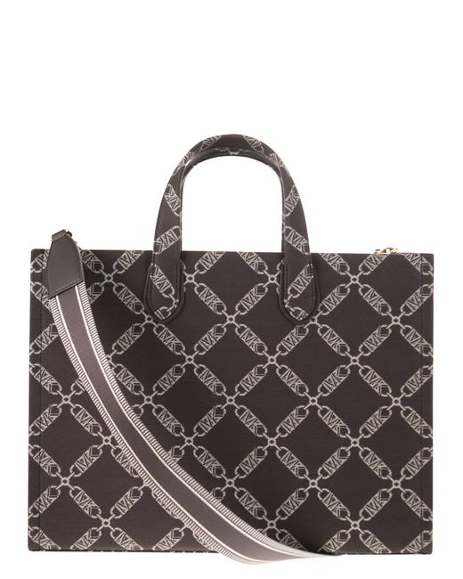 Michael Kors Gigi Empire Jacquard Logo Tote Bag in het Brown