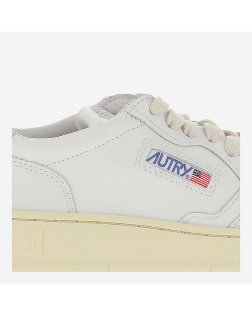 Autry White Leather Trainers With Front Lacing And Metallic Heel Tab