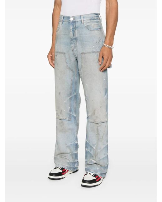 Amiri Blue Jeans With A Distressed Effect for men