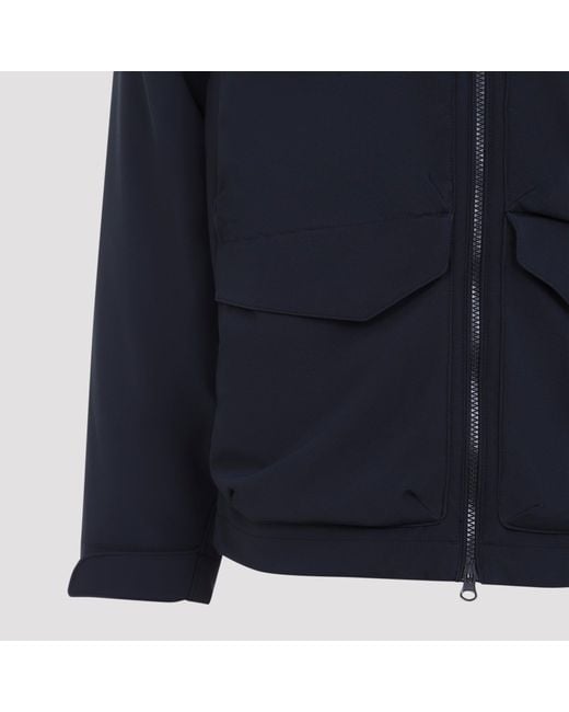 C P Company Blue Shell Padded Hooded Lens Jacket