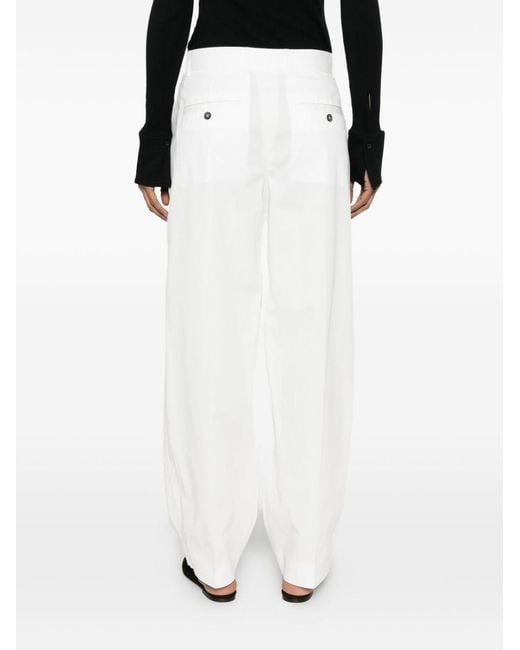 Totême White Pleated Wide-Leg Trousers
