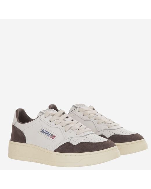 Autry White Round Toe Leather Sneakers With Suede Inserts And Logo Details
