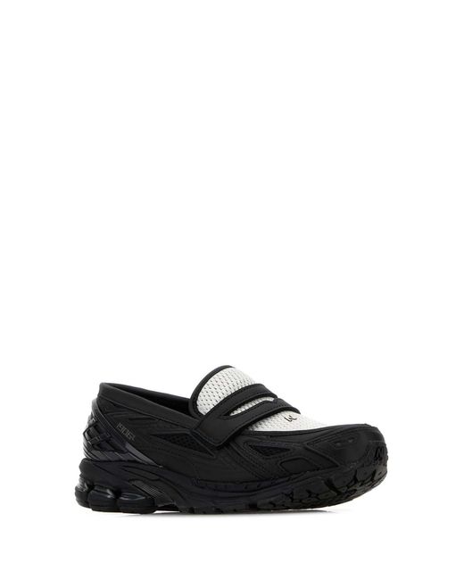 New Balance Black Sneakers
