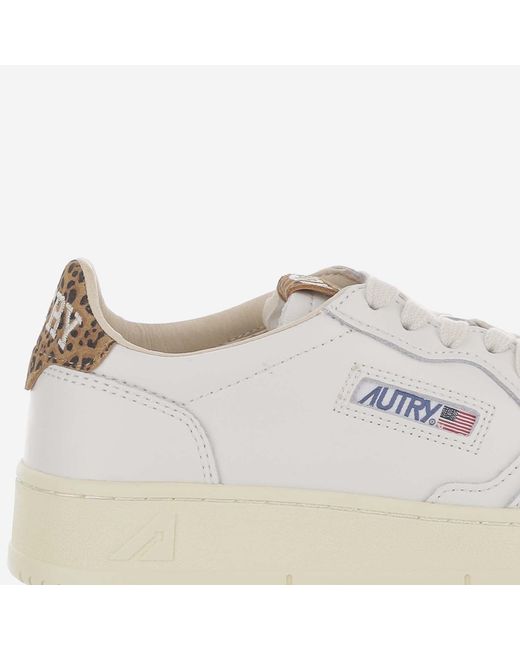Autry White Low-Top Leather Sneakers With Suede Heel Tab And Logo Accents