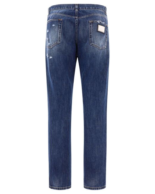 Jeans gamba dritta con dettagli strappati di Dolce & Gabbana in Blue da Uomo