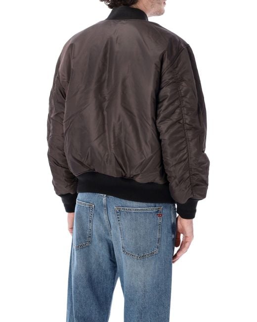 DIESEL Black Coats for men