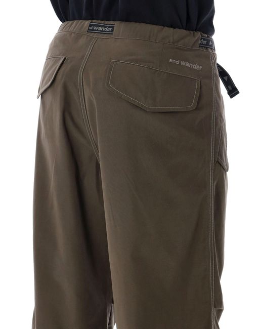 And Wander Green High Count Cloth Side Zip Hem Pants for men