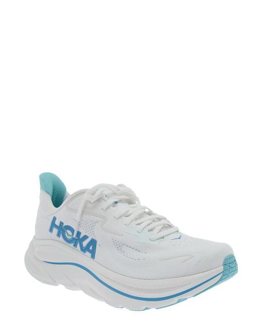 Hoka One One White 'Clifton 10' Low Top Sneakers With Logo Lettering On The Side And Logo Patch On The Tongue