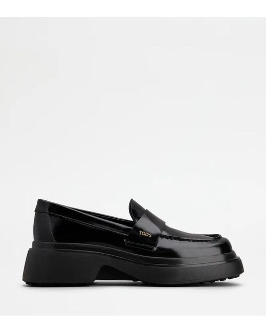 Tod's Black Flat Shoes