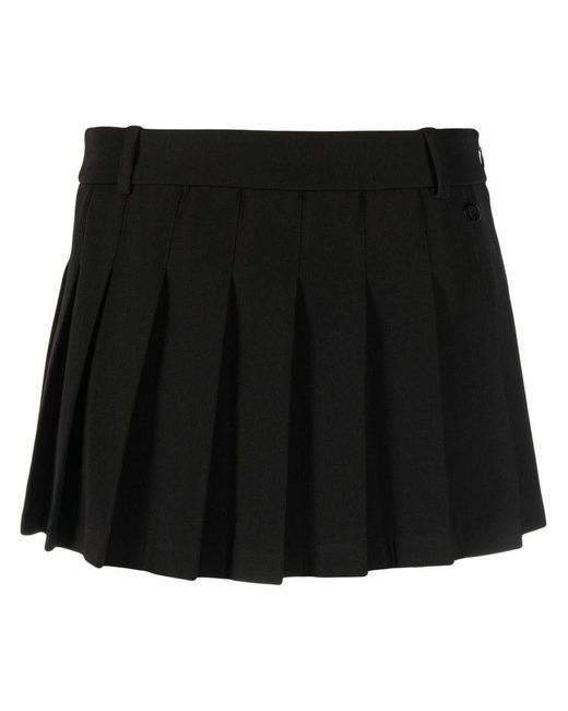 Chiara Ferragni Solid Pleated Mini-skirt in Black | Lyst